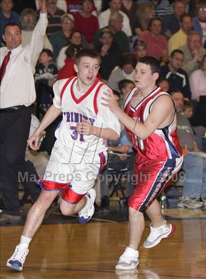 Thumbnail 1 in Trinity vs Manchester Memorial (NHIAA Class L Final) photogallery.
