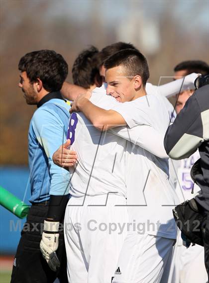Thumbnail 3 in Lansing vs Port Jefferson (NYSPHSAA Class C Final) photogallery.