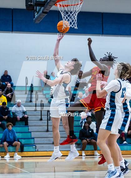 Thumbnail 1 in Judge Memorial Catholic vs Juan Diego Catholic (Juan Diego's Eagle Holiday Shootout) photogallery.