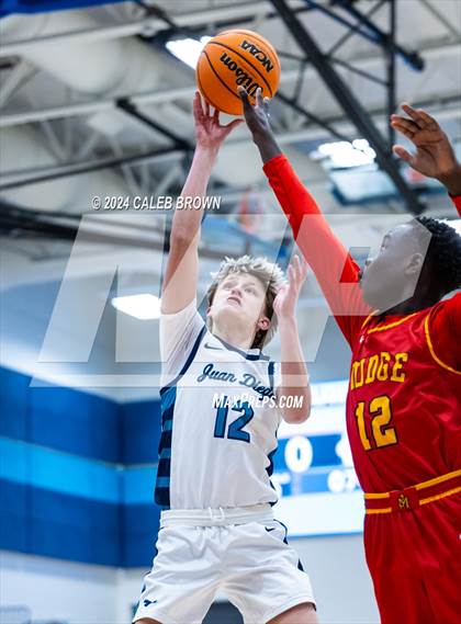 Thumbnail 1 in Judge Memorial Catholic vs Juan Diego Catholic (Juan Diego's Eagle Holiday Shootout) photogallery.