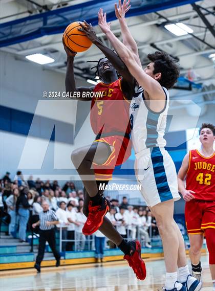 Thumbnail 3 in Judge Memorial Catholic vs Juan Diego Catholic (Juan Diego's Eagle Holiday Shootout) photogallery.