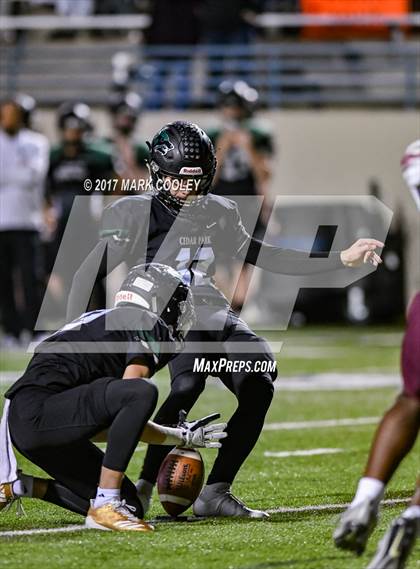 Thumbnail 3 in Ennis vs. Cedar Park (UIL 5A Area Playoff) photogallery.