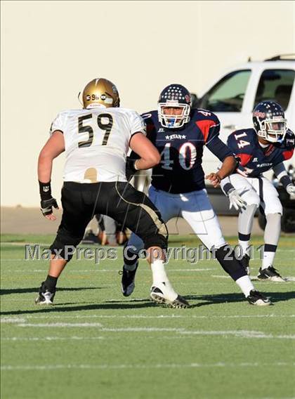 Thumbnail 2 in Ryan vs. Rider (4A Division 1 Region 1 Quarterfinals) photogallery.