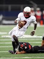 MacArthur QB Jason Frimpong runs from pressure. 
