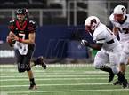 Colleyville QB Jeff Clavert escapes pressure.