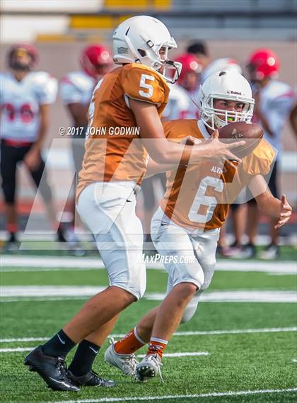 Thumbnail 3 in Alvin JV Orange vs Waltrip JV photogallery.