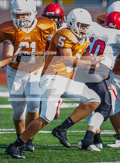 Thumbnail 2 in Alvin JV Orange vs Waltrip JV photogallery.