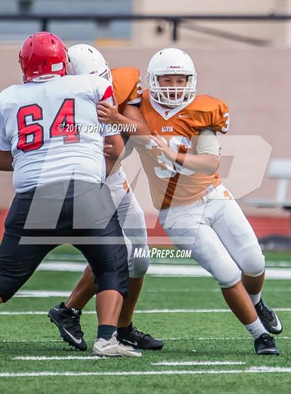 Thumbnail 2 in Alvin JV Orange vs Waltrip JV photogallery.