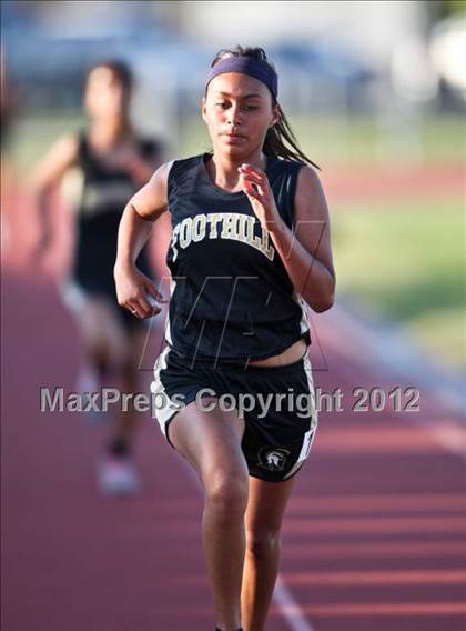 Thumbnail 1 in Titan Top 9 Invitational (Girls 3200m Run) photogallery.