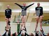 This MaxPreps.com professional photo is from the gallery Argonaut vs El Dorado (STUNT) which features Argonaut high school athletes playing  Cheer.