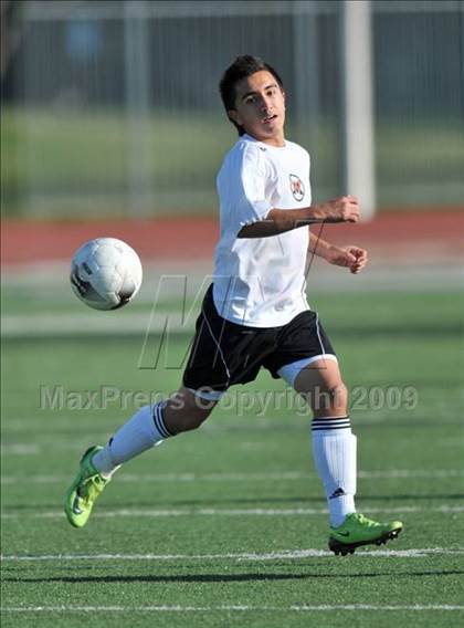Thumbnail 3 in Poteet vs. W. Mesquite (Class 4A, Region II semifinals) photogallery.