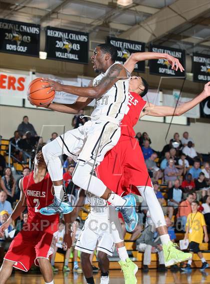 Thumbnail 3 in Neumann-Goretti vs. Denver East (City of Palms Classic) photogallery.