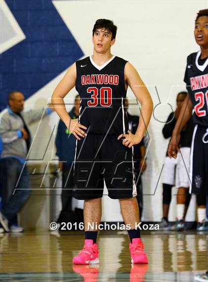 Thumbnail 1 in Oakwood vs. St. Genevieve (War on the Floor Extravaganza) photogallery.