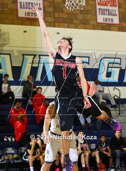 Thumbnail 1 in Oakwood vs. St. Genevieve (War on the Floor Extravaganza) photogallery.