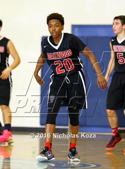 Thumbnail 1 in Oakwood vs. St. Genevieve (War on the Floor Extravaganza) photogallery.