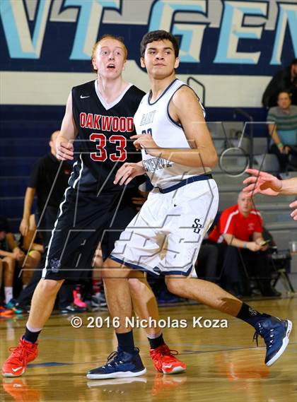 Thumbnail 1 in Oakwood vs. St. Genevieve (War on the Floor Extravaganza) photogallery.