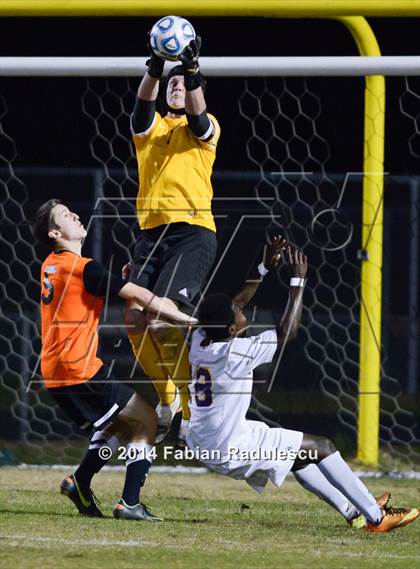 Thumbnail 2 in Broughton vs. New Hanover (NCHSAA 4A East Regional Final) photogallery.
