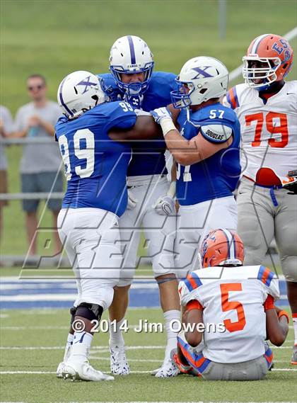 Thumbnail 3 in East St. Louis @ St. Xavier (2014 Crosstown Showdown) photogallery.