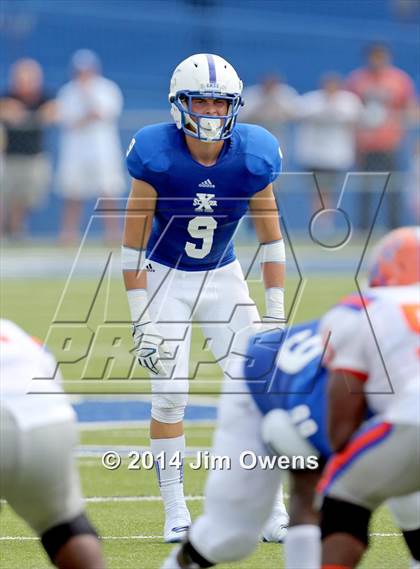 Thumbnail 3 in East St. Louis @ St. Xavier (2014 Crosstown Showdown) photogallery.