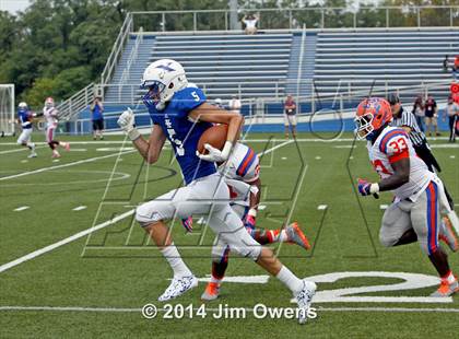 Thumbnail 3 in East St. Louis @ St. Xavier (2014 Crosstown Showdown) photogallery.
