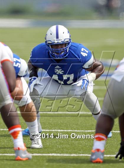 Thumbnail 3 in East St. Louis @ St. Xavier (2014 Crosstown Showdown) photogallery.