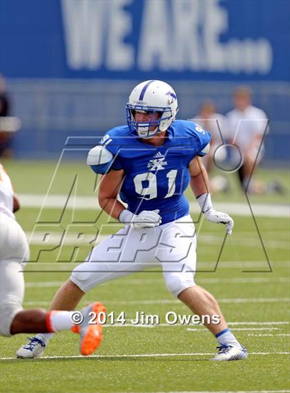 Thumbnail 3 in East St. Louis @ St. Xavier (2014 Crosstown Showdown) photogallery.