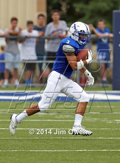 Thumbnail 3 in East St. Louis @ St. Xavier (2014 Crosstown Showdown) photogallery.
