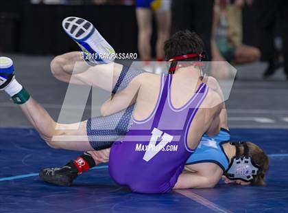 Thumbnail 3 in NYSPHSAA D1 Wrestling Championships (Semifinals 99 -126 lbs) photogallery.