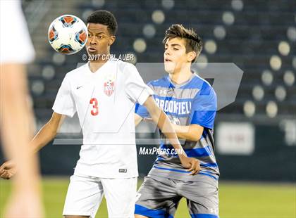 Thumbnail 1 in Denver East vs. Broomfield (CHSAA 5A Final) photogallery.