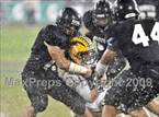 Battling for more yardage. 