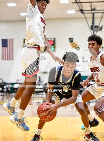 Thumbnail 1 in Centennial vs. St. John Bosco (The Classic at Damien) Tournament photogallery.