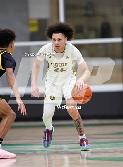 Thumbnail 1 in Mt. Pleasant vs. Denison (UIL 5A D2 Bi-District Basketball Playoff) photogallery.