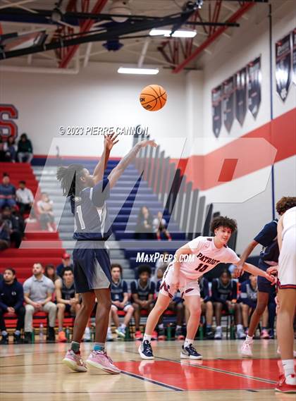 Thumbnail 3 in Osbourn vs. Patriot (District Semifinal) photogallery.