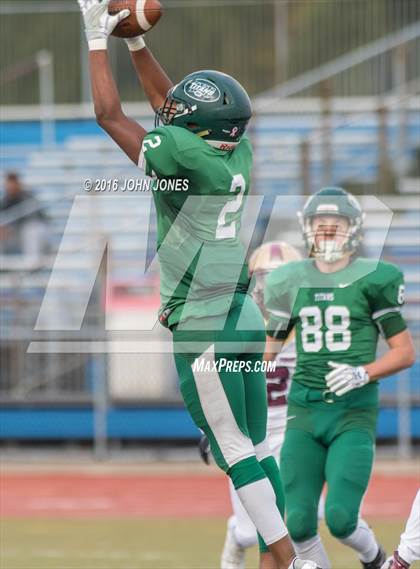 Thumbnail 1 in Holy Trinity vs. Iona Prep (NYCHSFL Class AA Final) photogallery.