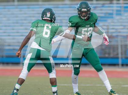 Thumbnail 2 in Holy Trinity vs. Iona Prep (NYCHSFL Class AA Final) photogallery.