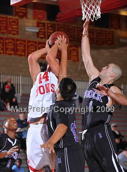 Thumbnail 3 in Cathedral vs The Rock Academy (MaxPreps Holiday Classic) photogallery.