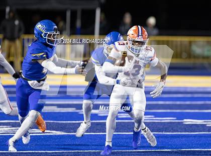 Thumbnail 3 in Madison Central vs. Tupelo (MHSAA 7A North State Championship) photogallery.