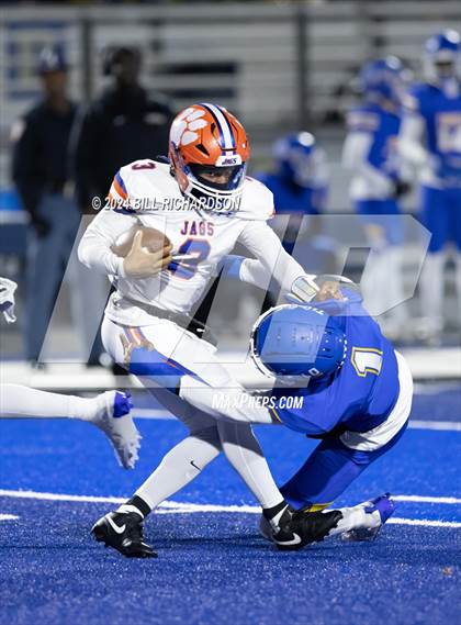 Thumbnail 3 in Madison Central vs. Tupelo (MHSAA 7A North State Championship) photogallery.