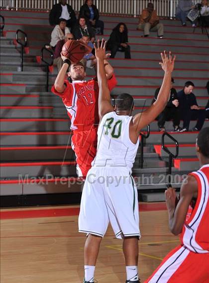 Thumbnail 1 in Leuzinger vs. Poly (MaxPreps Holiday Classic) photogallery.