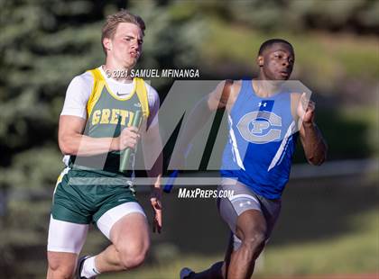 Thumbnail 1 in Metro Conference Track and Field Meet (4X100 Meter) photogallery.