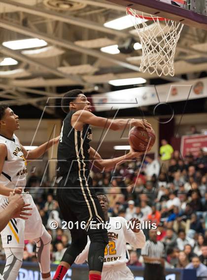 Thumbnail 1 in Putnam Vo-Tech vs. Central (Spalding Hoophall Classic) photogallery.