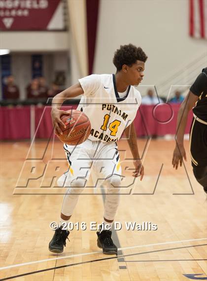 Thumbnail 1 in Putnam Vo-Tech vs. Central (Spalding Hoophall Classic) photogallery.