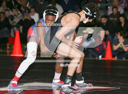 Thumbnail 1 in Suffolk County High School League IV Wrestling Finals photogallery.