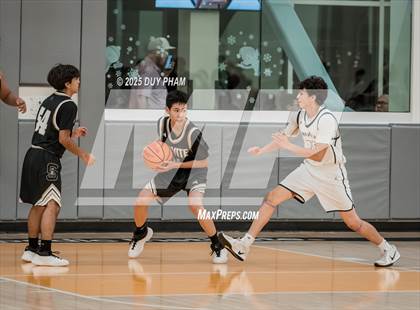 Thumbnail 3 in JV: Servite (Black) vs San Juan Hills photogallery.