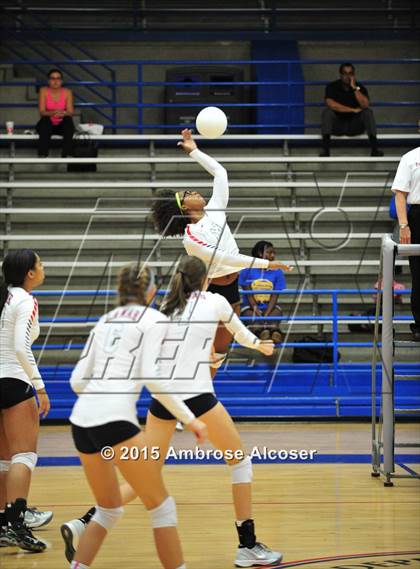 Thumbnail 2 in Reagan vs Lamar (34th Annual Houston ISD Varsity Volleyball Tournament) photogallery.