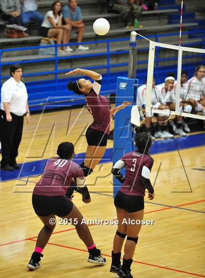 Thumbnail 2 in Reagan vs Lamar (34th Annual Houston ISD Varsity Volleyball Tournament) photogallery.