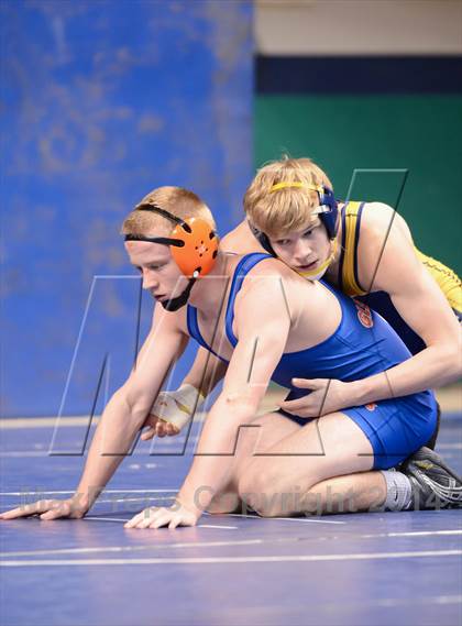 Thumbnail 1 in NCHSAA Individual Wrestling 4A Quarterfinals photogallery.