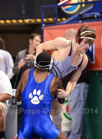 Thumbnail 2 in NCHSAA Individual Wrestling 4A Quarterfinals photogallery.