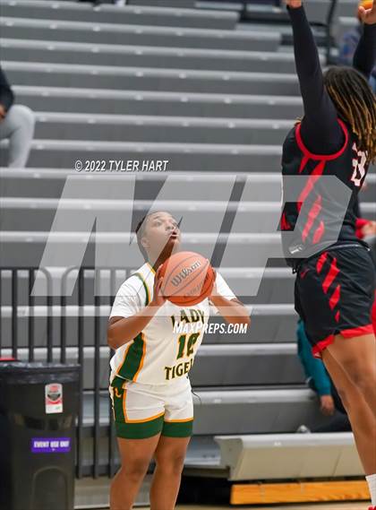 Thumbnail 1 in Indianapolis Crispus Attucks vs. North Central (Sneakers for Santa Shootout) photogallery.