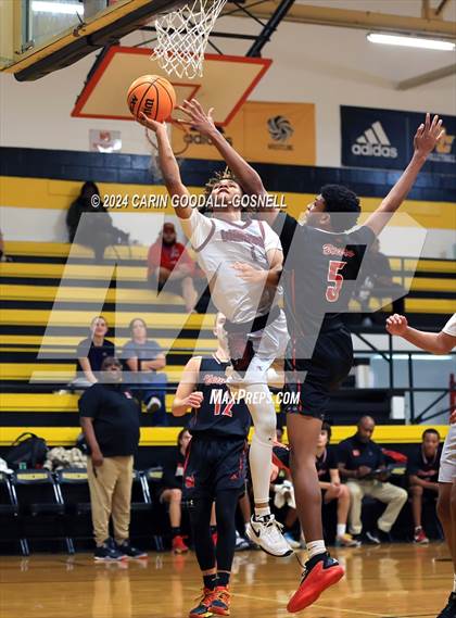 Thumbnail 2 in Living Water Christian vs. New Bern (Hurricane Holiday Classic) photogallery.